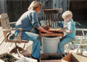 Pat and Adam Campbell crushing grapes